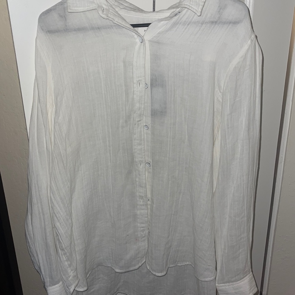 White button up shirt its a size L it has never been worn